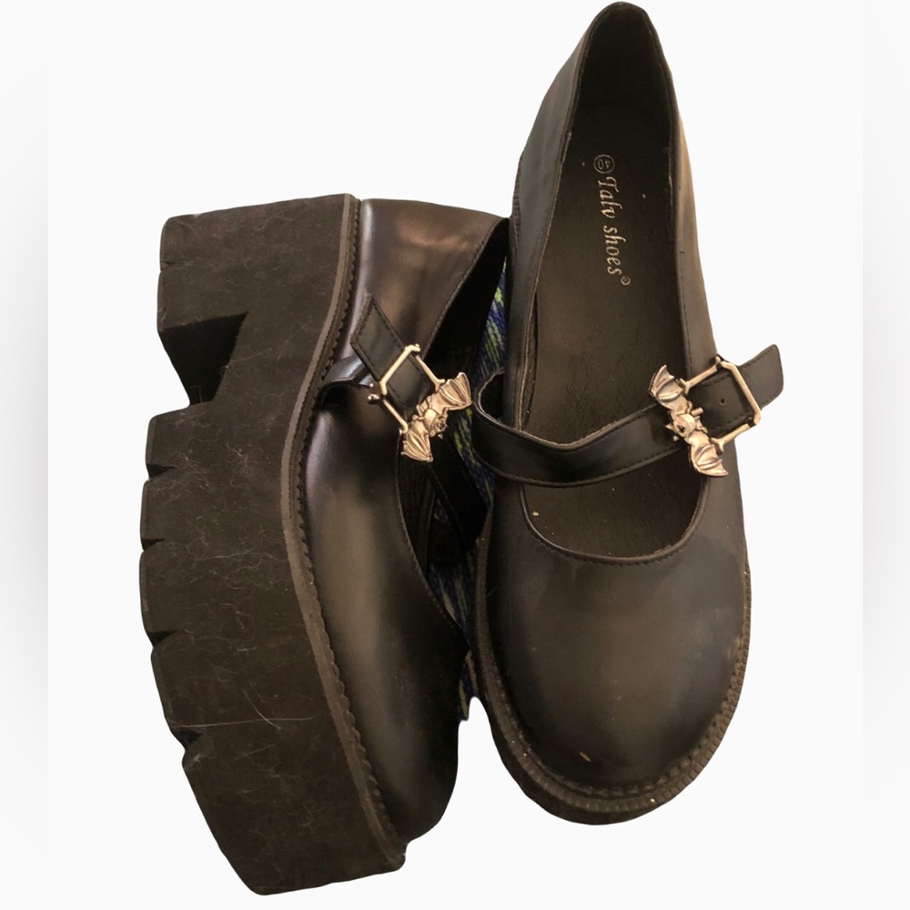 Talv Shoes- Platform heels with vintage bat buckle. Sells retail for about $45